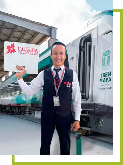 Hombre sonriendo sosteniendo una señal con la leyenda "Canada Transfers".